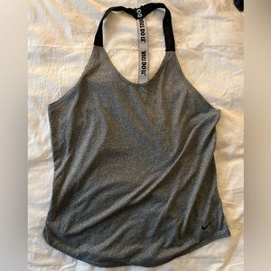 Women’s grey Nike workout top
